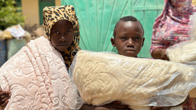 Soudanais secourus par l'ONG turque IHH. Crédit photo : AA