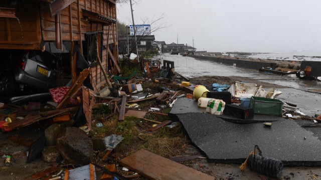 Des bâtiments endommagés dans une zone touchée par les vagues de tsunami dans le district de Jike dans la ville de Suzu, dans la préfecture d'Ishikawa, le 7 janvier 2024, après qu'un tremblement de terre majeur de magnitude 7,5 a frappé la région de Noto au Japon, le jour de l'An.