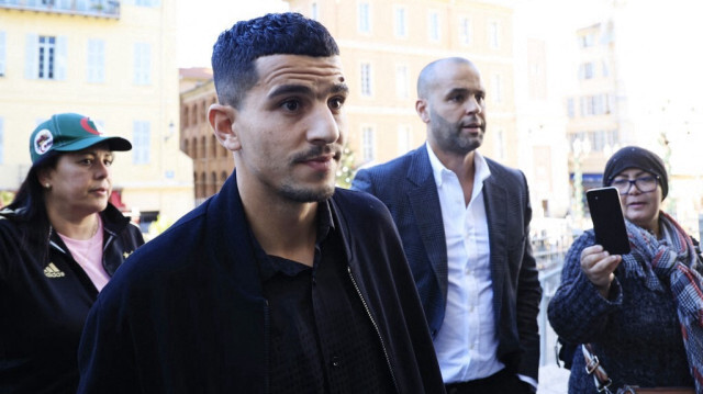 Le défenseur algérien de Nice Youcef Atal arrive au palais de justice de Nice, dans le sud de la France, pour son procès pour incitation à la haine, le 18 décembre 2023.