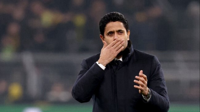 Le président qatari du Paris Saint-Germain, Nasser al-Khelaifi, réagit après le match de football de la Ligue des champions de l'UEFA du groupe F entre le Borussia Dortmund et le Paris Saint-Germain à Dortmund,  le 13 décembre 2023.