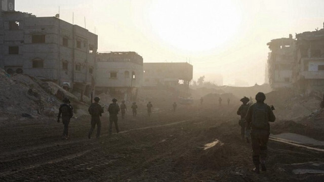 Cette photo diffusée par l'armée israélienne montre des soldats israéliens opérant dans la bande de Gaza, le 12 janvier 2024.