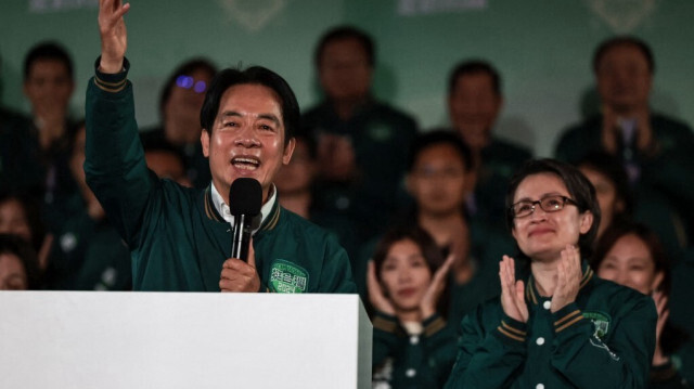 Le président élu de Taïwan Lai Ching-te et son compagnon de course Hsiao Bi-khim lors d'un rassemblement devant le siège du Parti démocratique progressiste (DPP) à Taipei le 13 janvier 2024, après avoir remporté l'élection présidentielle.