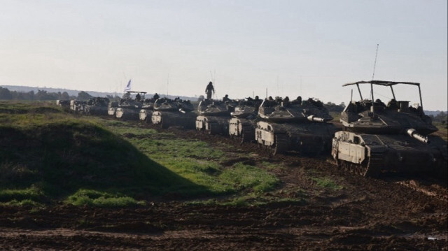 Un convoi de véhicules blindés israéliens revenant du territoire Palestinien, le 15 janvier 2024.