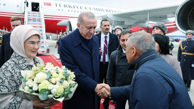 Turkish President Recep Tayyip Erdogan (R) arrives with Turkish First Lady Emine Erdogan (L) to attend the 16th BRICS Summit in Kazan, Russia on October 23, 2024.