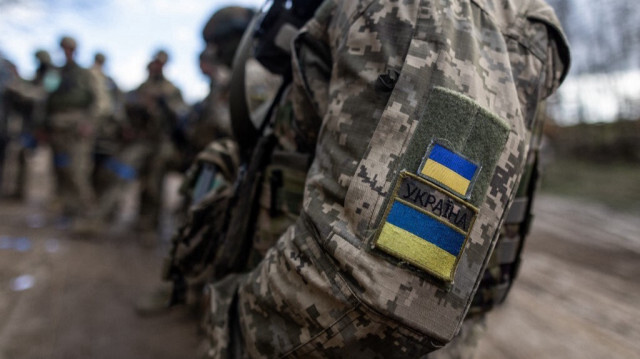 Des soldats ukrainiens lors d'un entraînement militaire avec des soldats français, dans un complexe d'entraînement militaire situé dans un lieu non divulgué en Pologne, le 4 avril 2024.