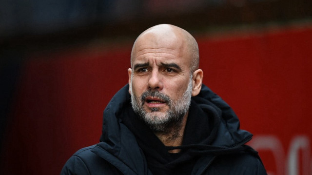 L'entraîneur espagnol de Manchester City, Pep Guardiola, réagit avant le match de Premier League anglaise entre Crystal Palace et Manchester City au Selhurst Park, dans le sud de Londres, le 7 décembre 2024.