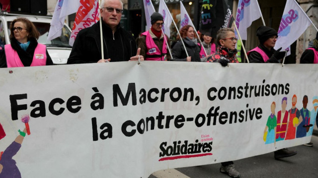 Des manifestants se sont rassemblés à Paris le 12 décembre 2024, à l’appel de la CGT, rejointe par les syndicats Solidaires et FSU, dans le cadre des mobilisations "pour l’emploi et l’industrie" organisées dans plusieurs villes de France.