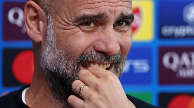 Le manager espagnol de Manchester City, Pep Guardiola, participe à une conférence de presse sur le terrain d'entraînement de Manchester City à Manchester, dans le nord-ouest de l'Angleterre, le 25 novembre 2024, à la veille du match de football de l'UEFA Champions League contre Feyenoord.