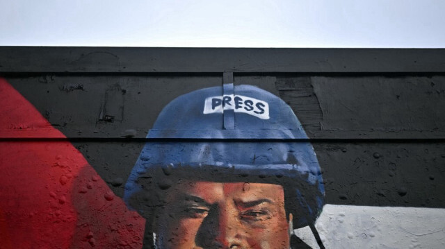 Une photographie prise le 29 janvier 2024 dans l'est de Londres montre un graffiti réalisé par l'artiste de rue espagnol Nacho Welles intitulé "Heroes of Palestine" (Héros de la Palestine).