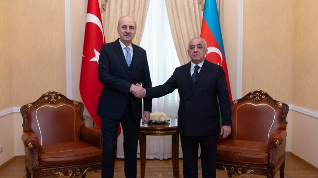 Turkish Parliament Speaker Numan Kurtulmus (L) and Azerbaijan's Prime Minister Ali Asadov (R)