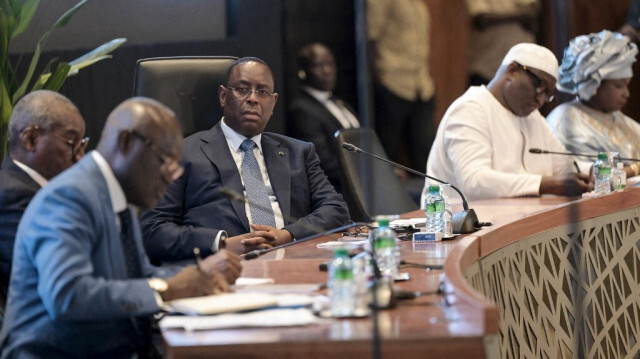 Le président sénégalais Macky Sall (C) lors du dialogue national à Diamniadio le 26 février 2024.