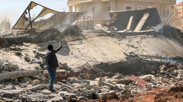 Les décombres d'un bâtiment détruit à la suite d'une frappe aérienne israélienne dans le Centre-est du Liban, le 12 mars 2024.