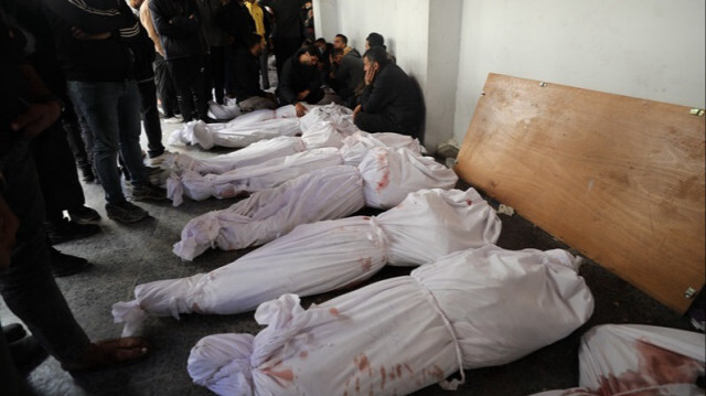 Des Palestiniens tués lors d'une frappe aérienne israélienne dans la Bande de Gaza, le 20 mars 2024.
