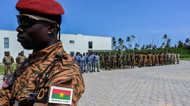 Des soldats de l'armée du Burkina Faso participent à l'entraînement militaire annuel Flintlock organisé par l'Académie internationale de lutte contre le terrorisme à Jacqueville, le 14 mars 2023.
