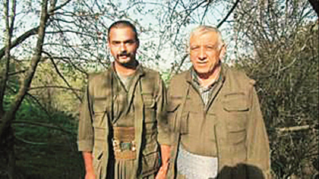 Terörist Hesenzade'nin elebaşılar Cemil Bayık ve Duran Kalkan'la fotoğrafları var.