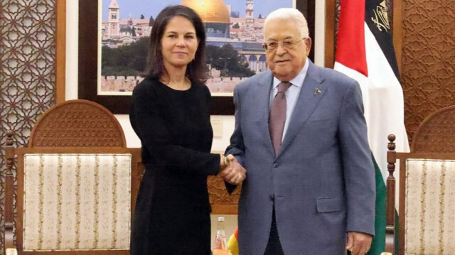 Palestinian President Mahmud Abbas (R) meets with German Foreign Minister Annalena Baerbock (L) in Ramallah, West Bank on March 25, 2024.