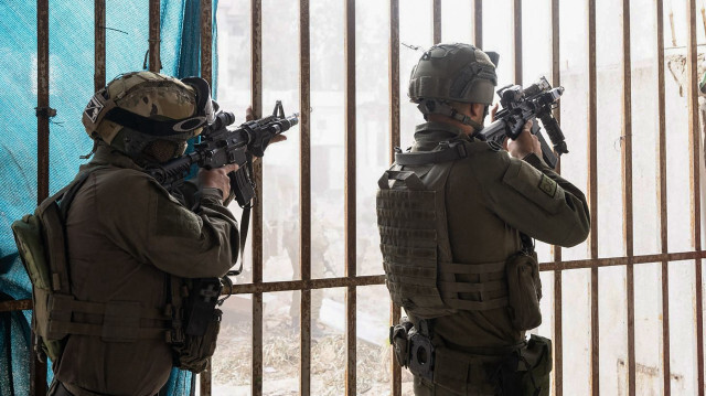 Des troupes sur le terrain dans la Bande de Gaza, au milieu des batailles en cours entre Israël et le groupe militant palestinien Hamas, le 27 mars.