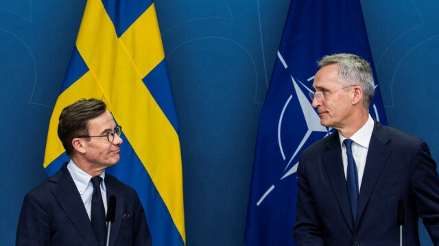 Le Premier ministre de Suède, Ulf Kristersson et le secrétaire général de l'OTAN, Jens Stoltenberg.