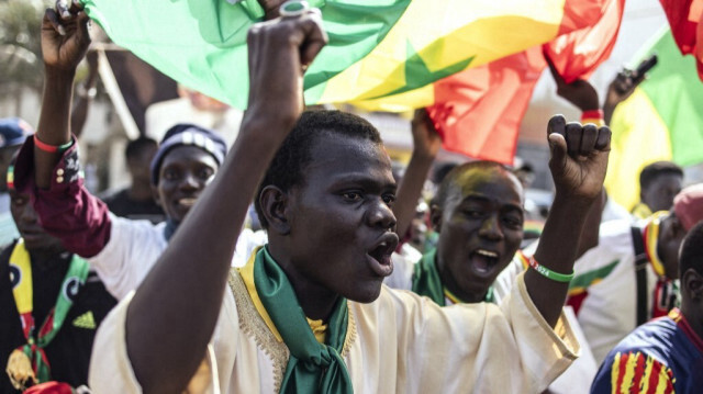 Un manifestant scande un slogan lors d'une marche à Dakar le 02 mars 2024, contre la nouvelle loi d'amnistie et pour la tenue de l'élection présidentielle avant le 02 avril 2024. 