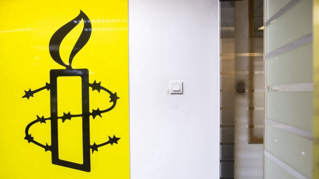 Le logo d'Amnesty International dans leur bureau à Hong Kong en octobre 2021.