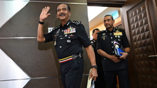 L'inspecteur général de la police royale de Malaisie, Razarudin Husain à Kuala Lumpur le 2 avril 2024, à la suite de l'arrestation de trois habitants et d'un homme israélien présumé qui a été pris avec six armes de poing.
