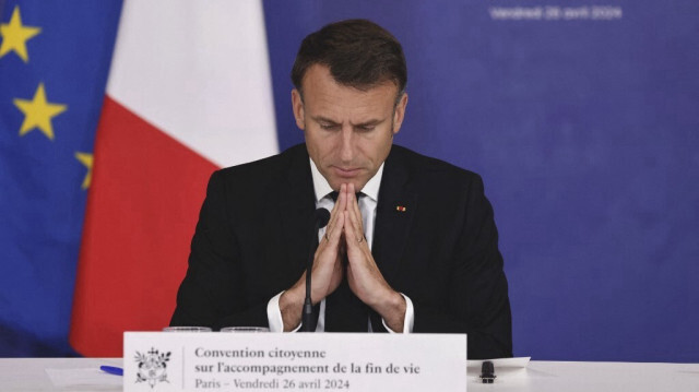 Le président français Emmanuel Macron prononce un discours lors du séminaire final de la Convention sur la fin de vie au Conseil économique, social et environnemental (CESE) à Paris, le 26 avril 2024.