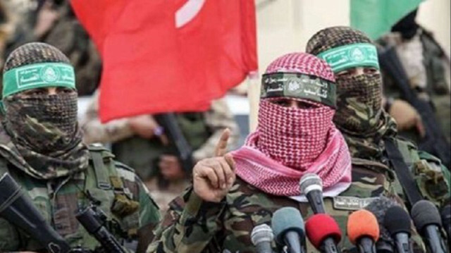 Les Brigades Al-Qassam , branche armée du mouvement de résistance du Hamas.