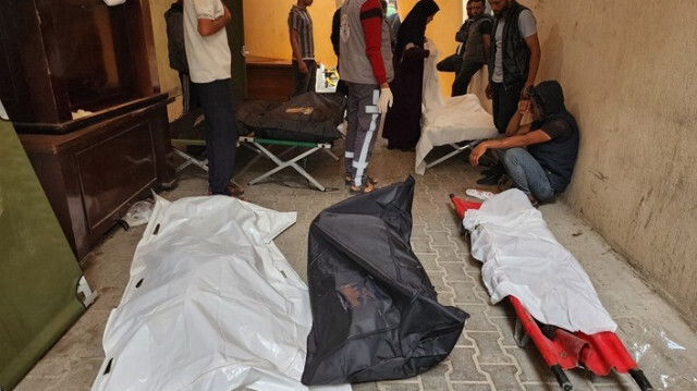 Les corps des Palestiniens tués lors de l'attaque menée par l'armée israélienne sur le quartier de Brazil à Rafah, situé dans le sud de la bande de Gaza, le 13 mai 2024.