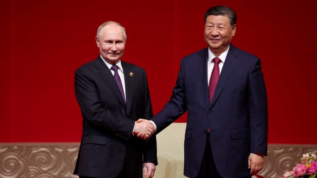 Le président russe Vladimir Poutine et le président chinois Xi Jinping assistent à un concert marquant le 75e anniversaire de l'établissement des relations diplomatiques entre la Russie et la Chine et l'ouverture des Années culturelles Chine-Russie au Centre national des arts de la scène à Pékin, le 16 mai 2024.