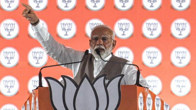 Le Premier ministre indien et chef du Bharatiya Janata Party (BJP) au pouvoir, Narendra Modi, s'exprime lors d'un meeting de campagne électorale à New Delhi, le 18 mai 2024, avant la cinquième phase du scrutin des élections générales en cours dans le pays.
