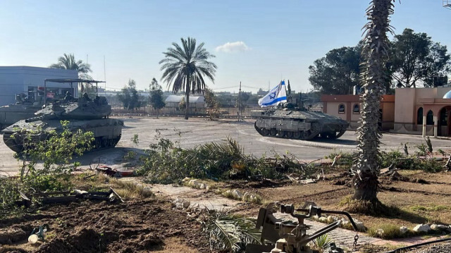 Израильская военная техника на контрольно-пропускном пункте Рафах со стороны Газы, 7 мая 2024 года. 