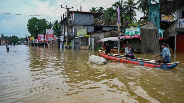 Une rue inondée aux abords de Colombo, le 3 juin 2024, suite aux pluies de mousson au Sri Lanka.