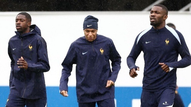 Ousmane Dembele, Kylian Mbappé et Marcus Thuram participent à une séance d'entraînement, le 30 juin 2024, à la veille de leur match des huitièmes de finale de l'Euro 2024 contre la Belgique.  