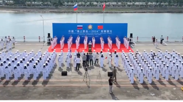 Cérémonie d'ouverture de l'exercice militaire conjoint sino-russe Joint Sea-2024, dans un port militaire de la ville de Zhanjiang, dans la province du Guangdong, dans le sud de la Chine, le 14 juillet 2024.
