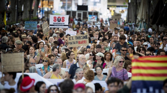 Des manifestants lors d'une protestation contre le surtourisme et les prix de l'immobilier sur l'île de Majorque, à Palma de Majorque, le 21 juillet 2024.