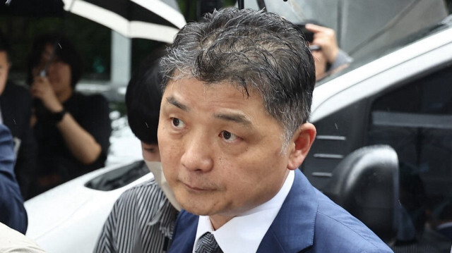 Kim Beom-su, fondateur de la société internet sud-coréenne Kakao, arrive au tribunal de Séoul le 22 juillet 2024.