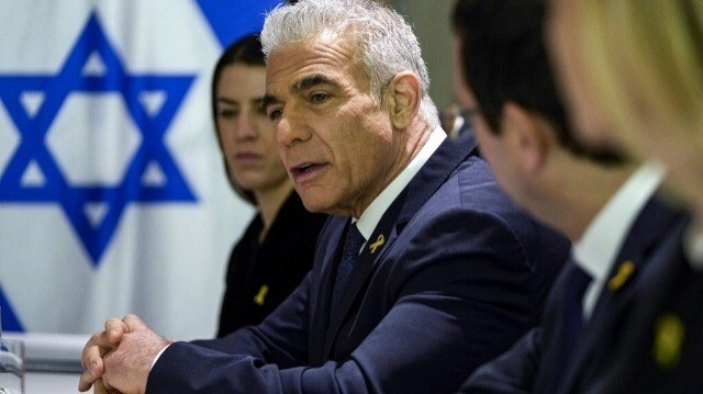 Le chef de l'opposition israélienne, Yair Lapid, rencontre le secrétaire d'État américain en visite à Tel Aviv, le 8 février 2024.