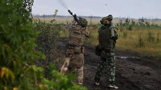 Soldats russe de l'unité "Tsentr" aux environs d'Ivanivka, dans la province de Donetsk, en Ukraine.