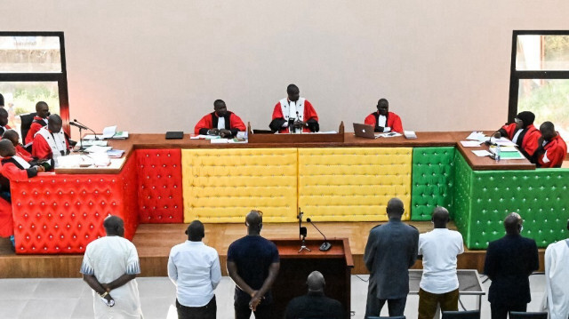 Les accusés se présentent devant le juge alors que la session débute au nouveau palais de justice de Conakry, le 28 septembre 2022, marquant l'ouverture du procès pour le massacre de 156 personnes en septembre 2009.