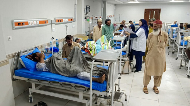 Des policiers blessés se reposent dans un hôpital, après une attaque à Rahim Yar Khan, dans la province du Pendjab, le 23 août 2024. 