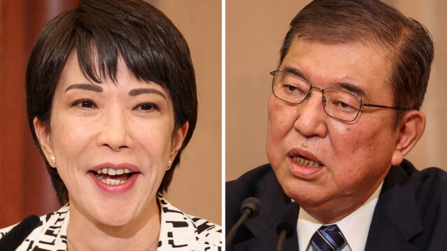 La ministre de la sécurité économique Sanae Takaichi (à gauche) et l'ancien ministre de la défense Shigeru Ishiba (à droite) lors d'un débat au club Nixon Kisha à Tokyo, le 14 septembre 2024.