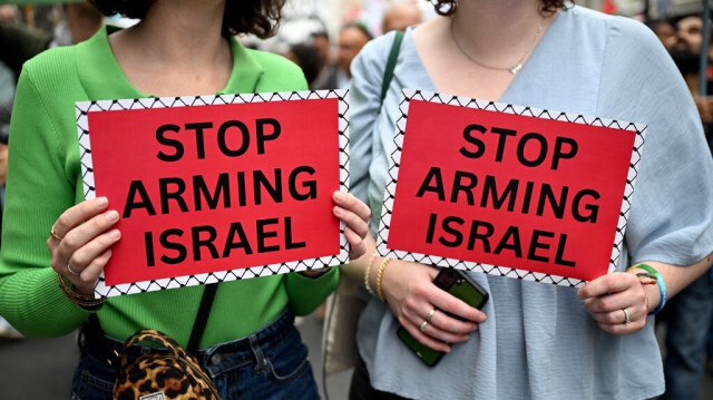 Des manifestants pro-palestiniens brandissent des pancartes, lors de la Journée nationale d'action pour la Palestine, à Londres, le 7 septembre 2024.