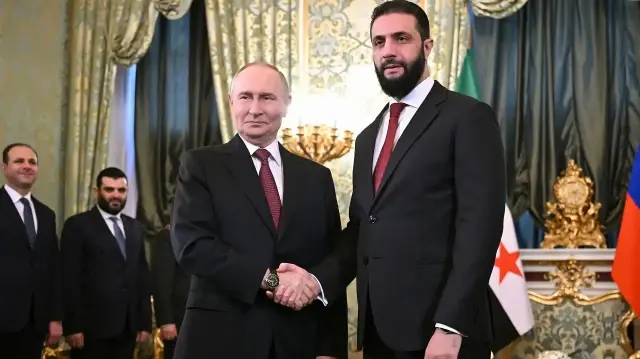 Президент России Владимир Путин и президент Сирии Ахмед аш-Шараа 
