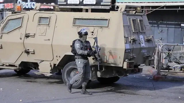 Israeli forces detain 24 Palestinians in West Bank raids