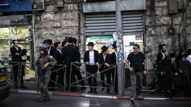 Ultra-Orthodox Israelis protest military draft with 'better death than army'