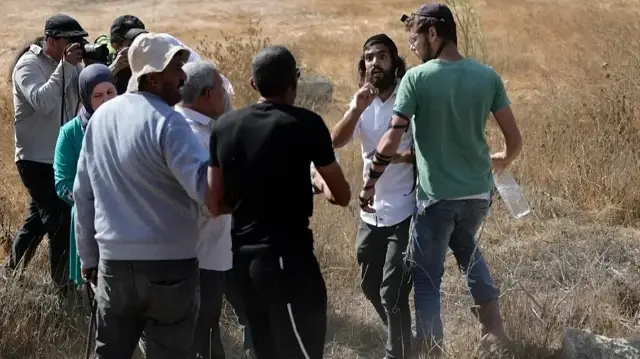 West Bank village recounts illegal settler attack under army protection