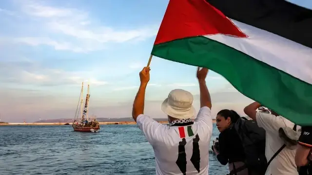 4 British activists on Gaza flotilla arrive in UK