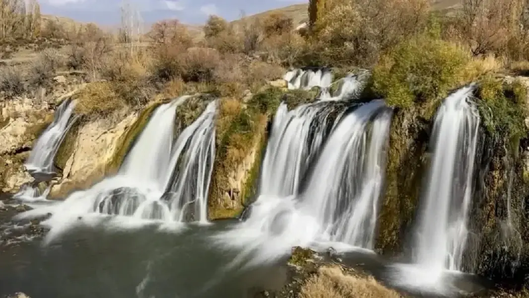 <p>Muradiye Waterfall in eastern Türkiye's Van province has become a focal point for nature enthusiasts and photographers as autumn transforms the surrounding landscape. The natural attraction now showcases a vibrant palette of seasonal colors, with yellowing trees creating a picturesque backdrop for the cascading waters that draw increasing numbers of visitors during the fall period.</p>