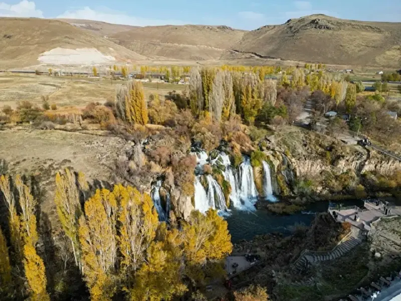 <p><strong>Photographic Opportunities and Visitor Experience</strong></p><p><br></p><p>Visitors to the waterfall area are capturing the striking scenery using mobile phones and professional cameras alike, documenting the unique intersection of natural water features and autumn foliage. The location provides exceptional photographic conditions where the dynamic movement of water contrasts with the static beauty of color-changing trees, creating compelling visual compositions that highlight Türkiye's diverse natural attractions beyond its well-known historical and cultural sites.</p>