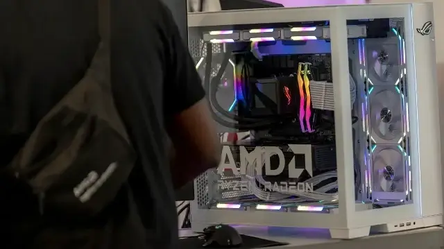 Un ordinateur présentant les produits AMD est visible au Sommet international du jeu de Montréal (MIGS) à Montréal, au Québec, le 11 novembre 2025.